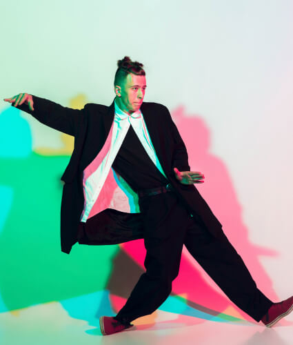 young beautiful man dancing hip hop street style isolated studio 1.jpg